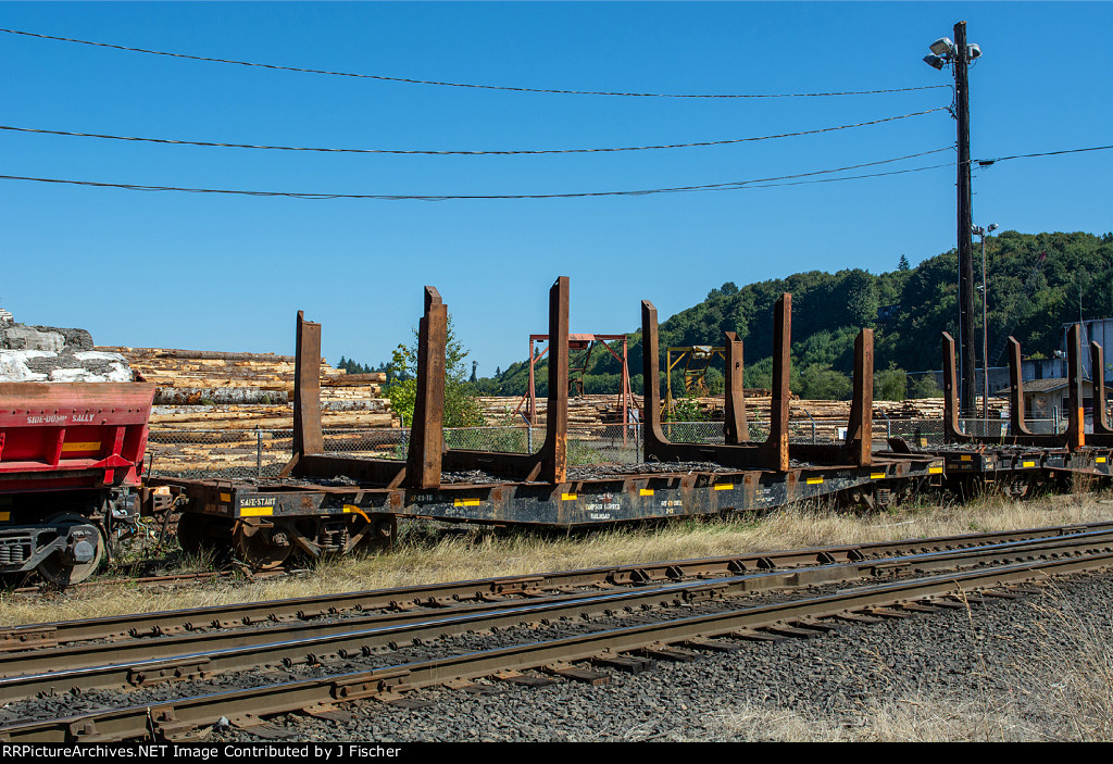 STC log hauling freight car